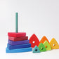 multiple wooden ranibow coloured triangles are shown, some are stacked on top of each other